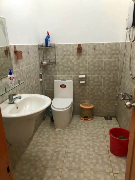 Two-Bedroom Single-Storey House with Large Car Yard on Huynh Thi Chau Street