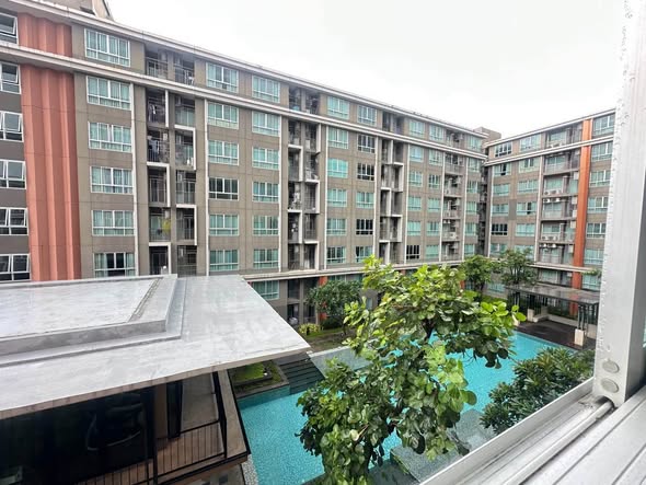 Fully Furnished One-Bedroom Condo with Pool View at D Condo Hyde Chiang Rai