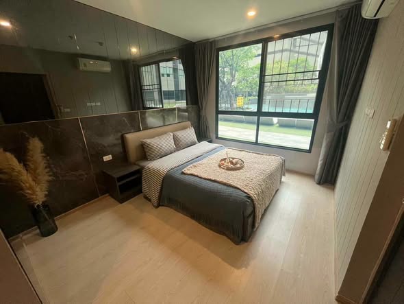 Spacious Two-Bedroom Condo with Pool View at Elio Del Nest Udomsuk