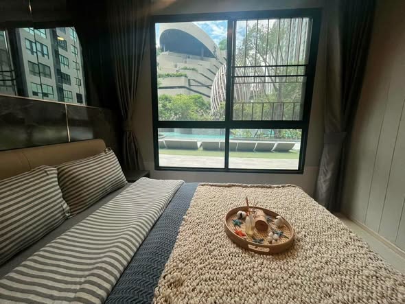 Spacious Two-Bedroom Condo with Pool View at Elio Del Nest Udomsuk