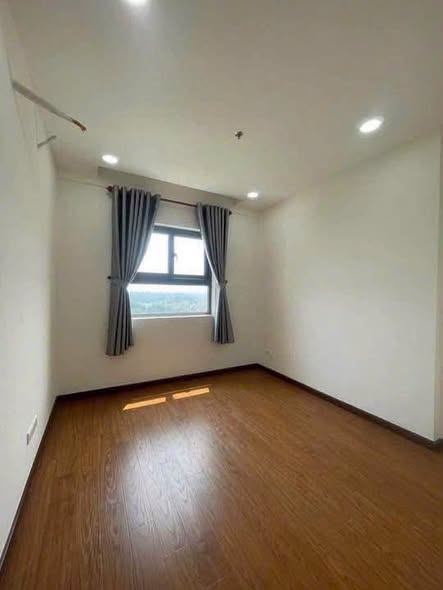 Unfurnished Two-Bedroom Apartment with Balcony at Minh Quoc Apartment