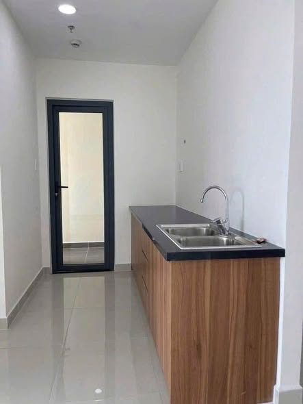 Unfurnished Two-Bedroom Apartment with Balcony at Minh Quoc Apartment