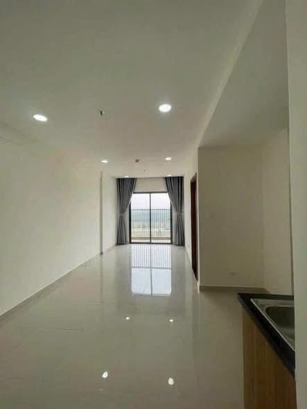 Unfurnished Two-Bedroom Apartment with Balcony at Minh Quoc Apartment