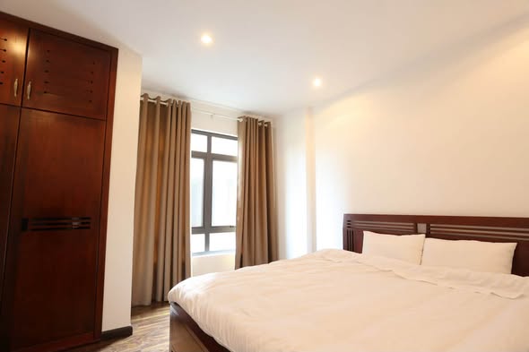 Bright Fully Furnished One-Bedroom Apartment with Large Balcony on Hoang Quoc Viet Street