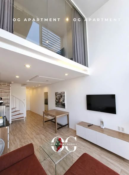 Bright Two-Bedroom Duplex Apartment with Weekly Housekeeping near District 3