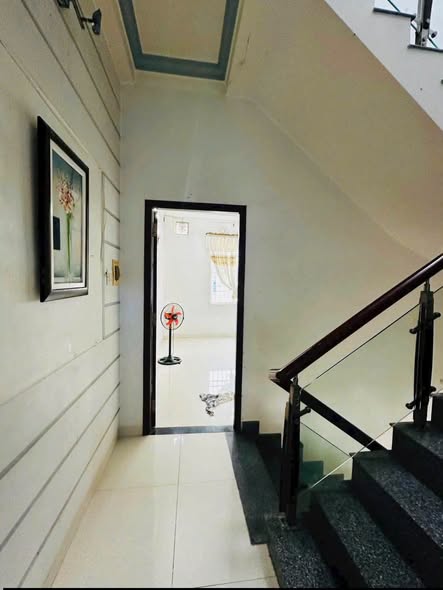 Three-Bedroom Three-Storey House with Spacious Front Yard near Den Bon Ngon