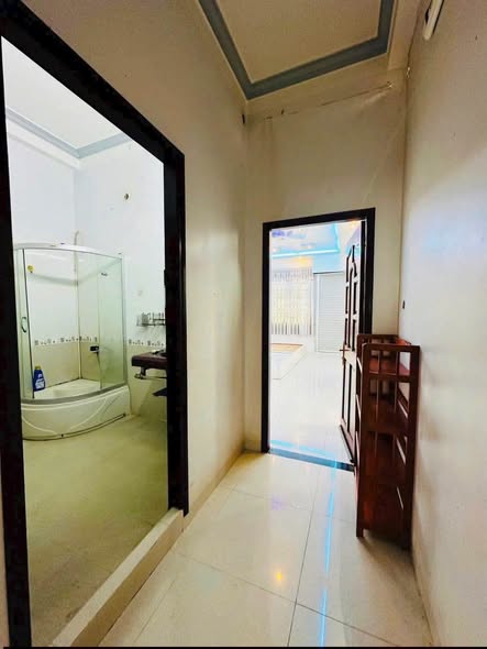 Three-Bedroom Three-Storey House with Spacious Front Yard near Den Bon Ngon