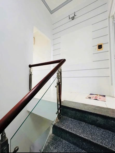 Three-Bedroom Three-Storey House with Spacious Front Yard near Den Bon Ngon
