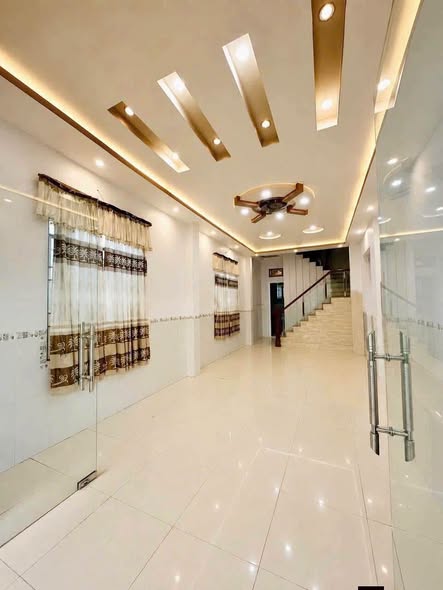 Three-Bedroom Three-Storey House with Spacious Front Yard near Den Bon Ngon