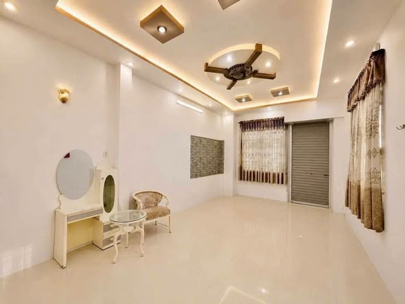 Three-Bedroom Three-Storey House with Spacious Front Yard near Den Bon Ngon